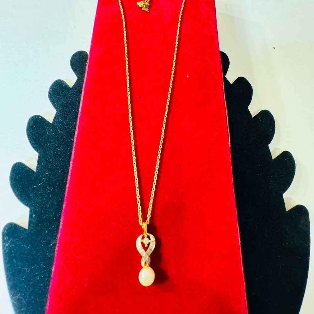 Nina Ricci Gold and Silver Infinity Necklace - Picture 4 of 9